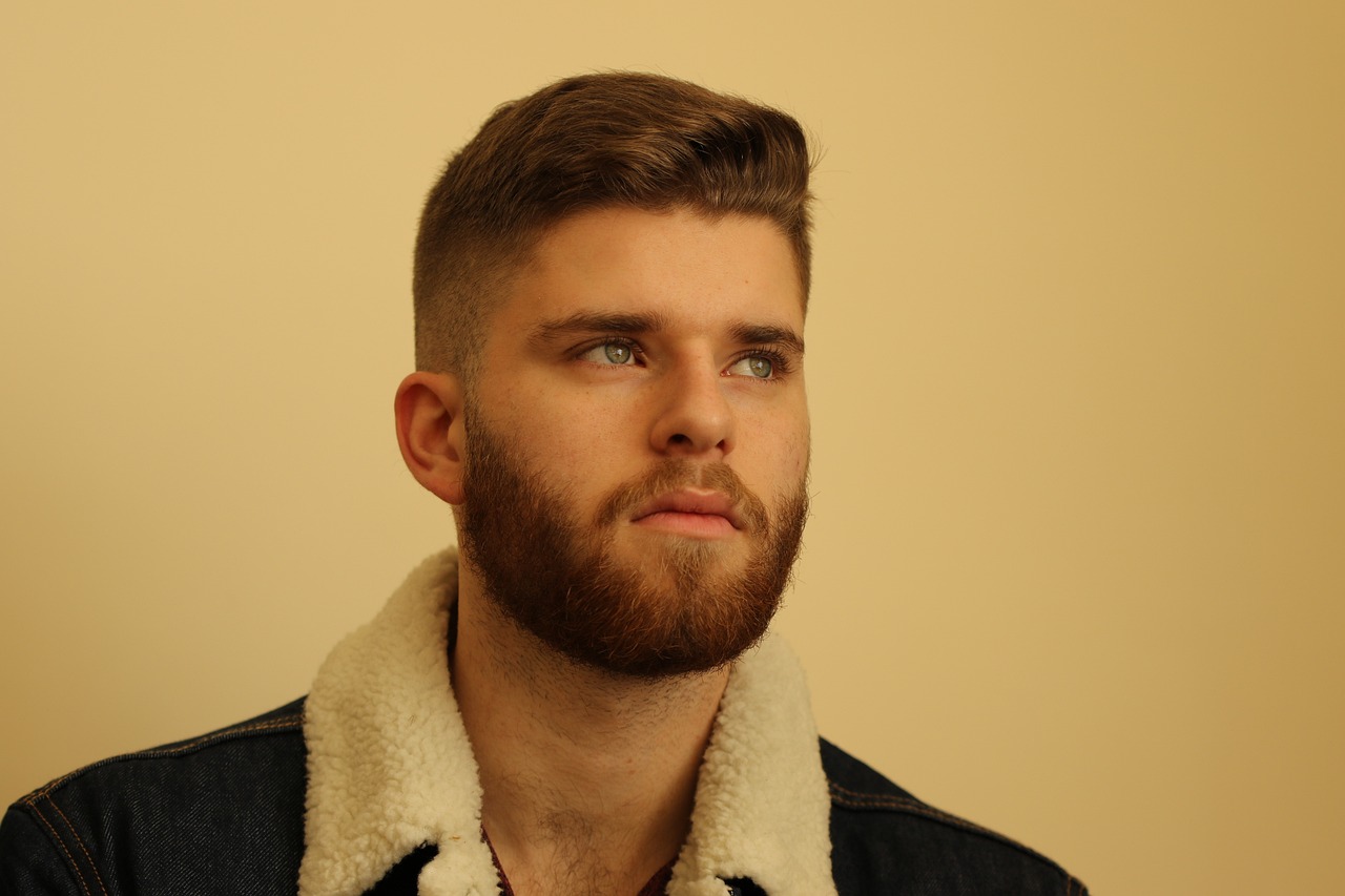 Image of a groomed beard on a young man